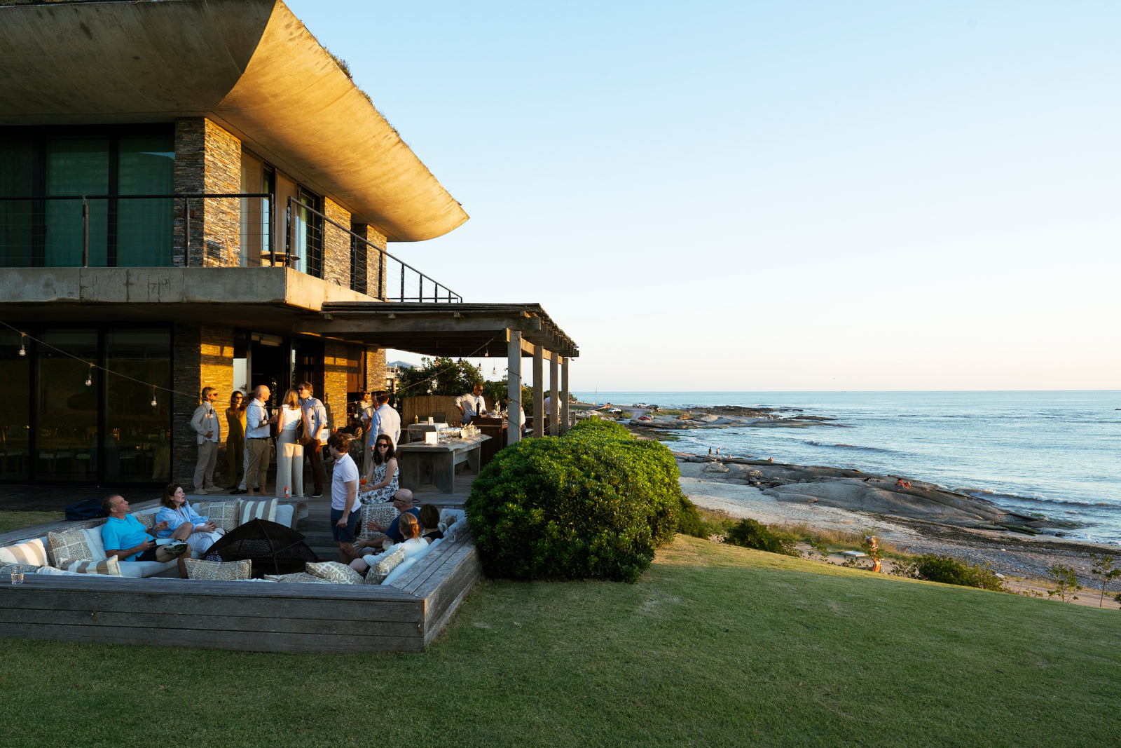 Seaside gathering at a modern house