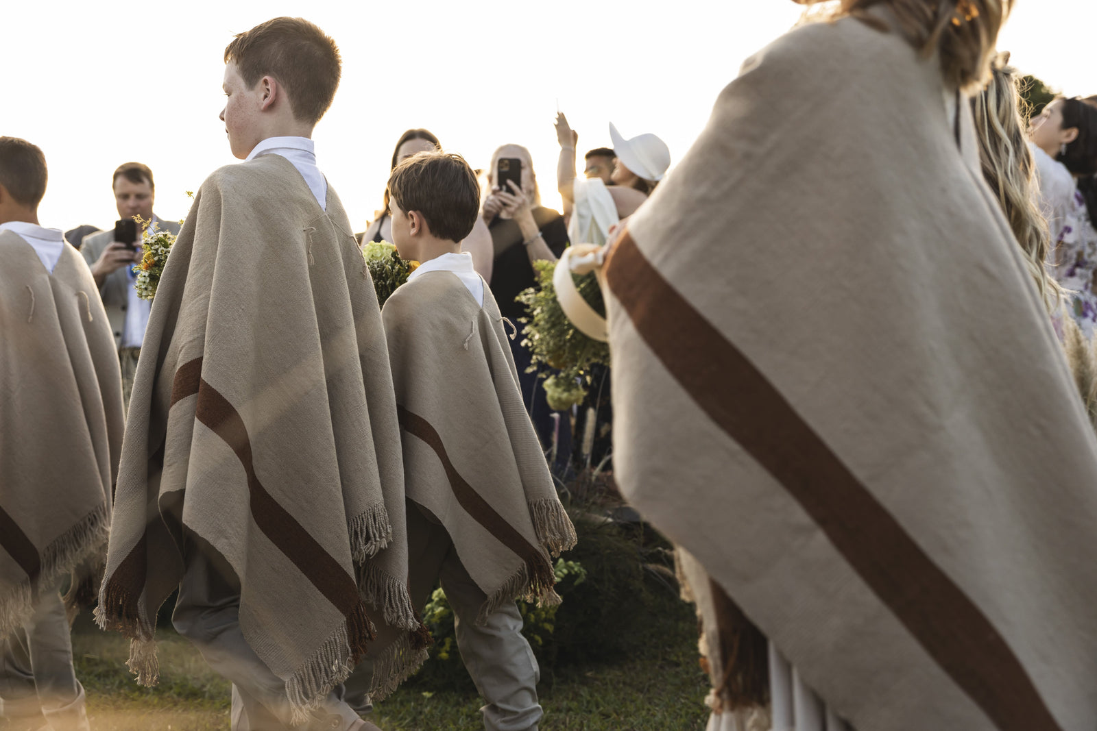 Guests wrapped in ponchos