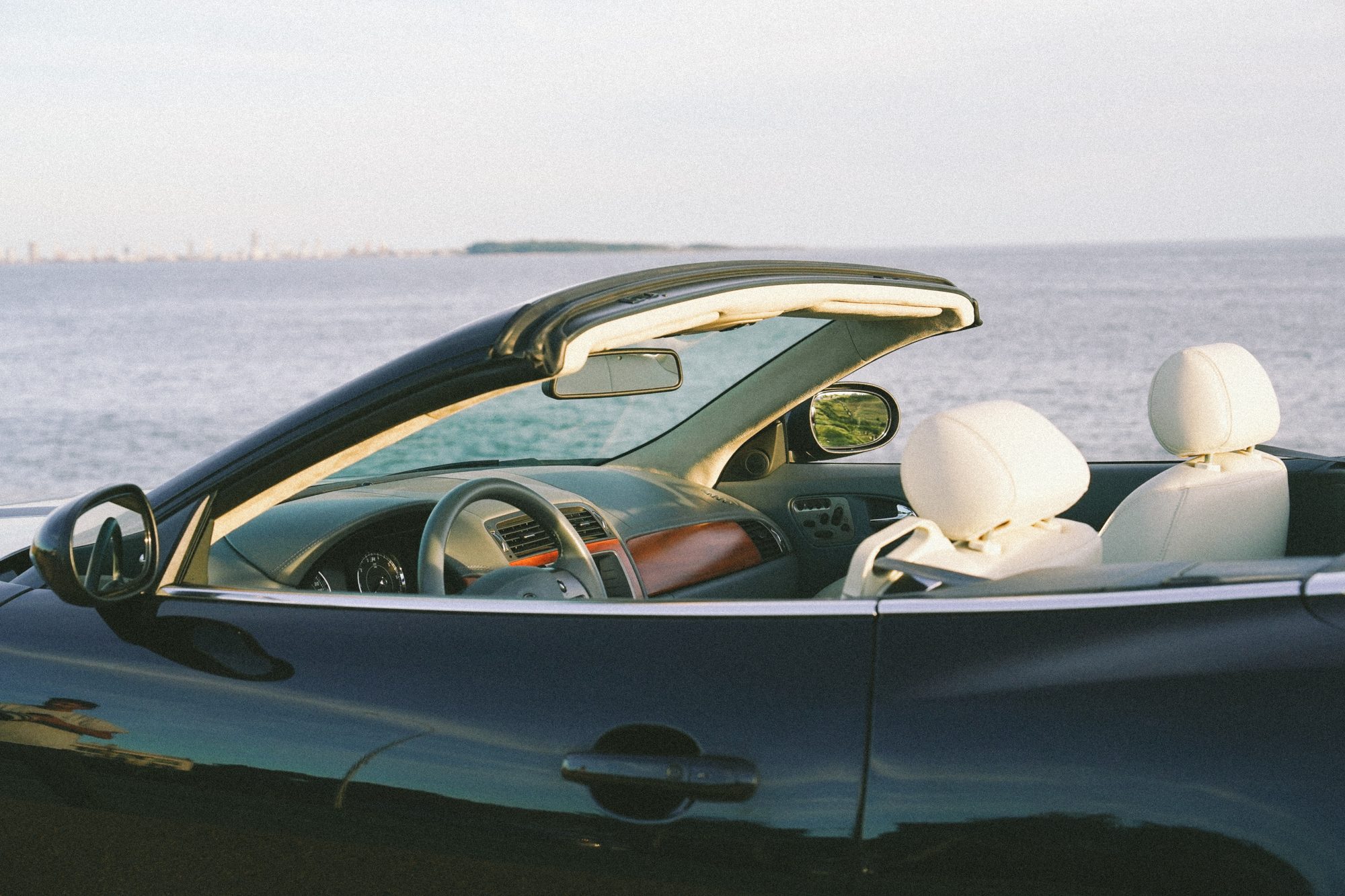 Convertible interior overlooking the sea