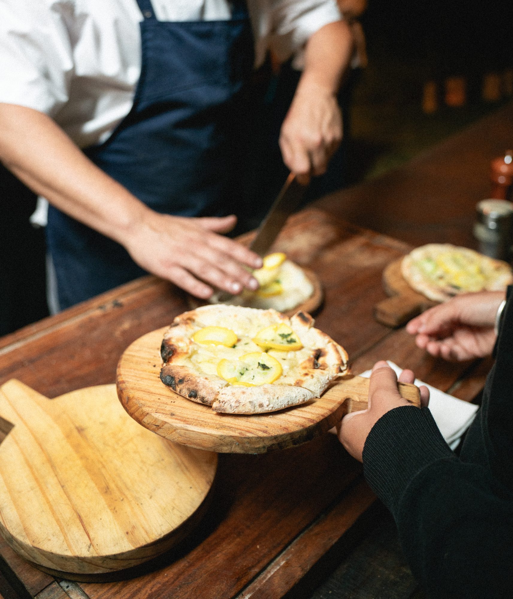 Wood-fired pizza served at the event