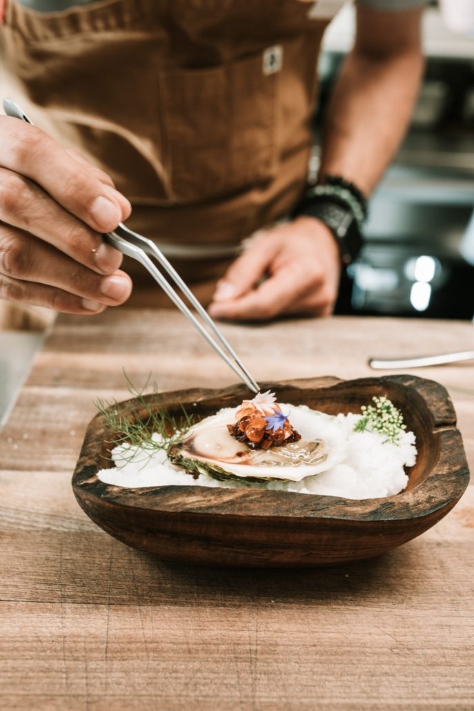 Chef plating a dish